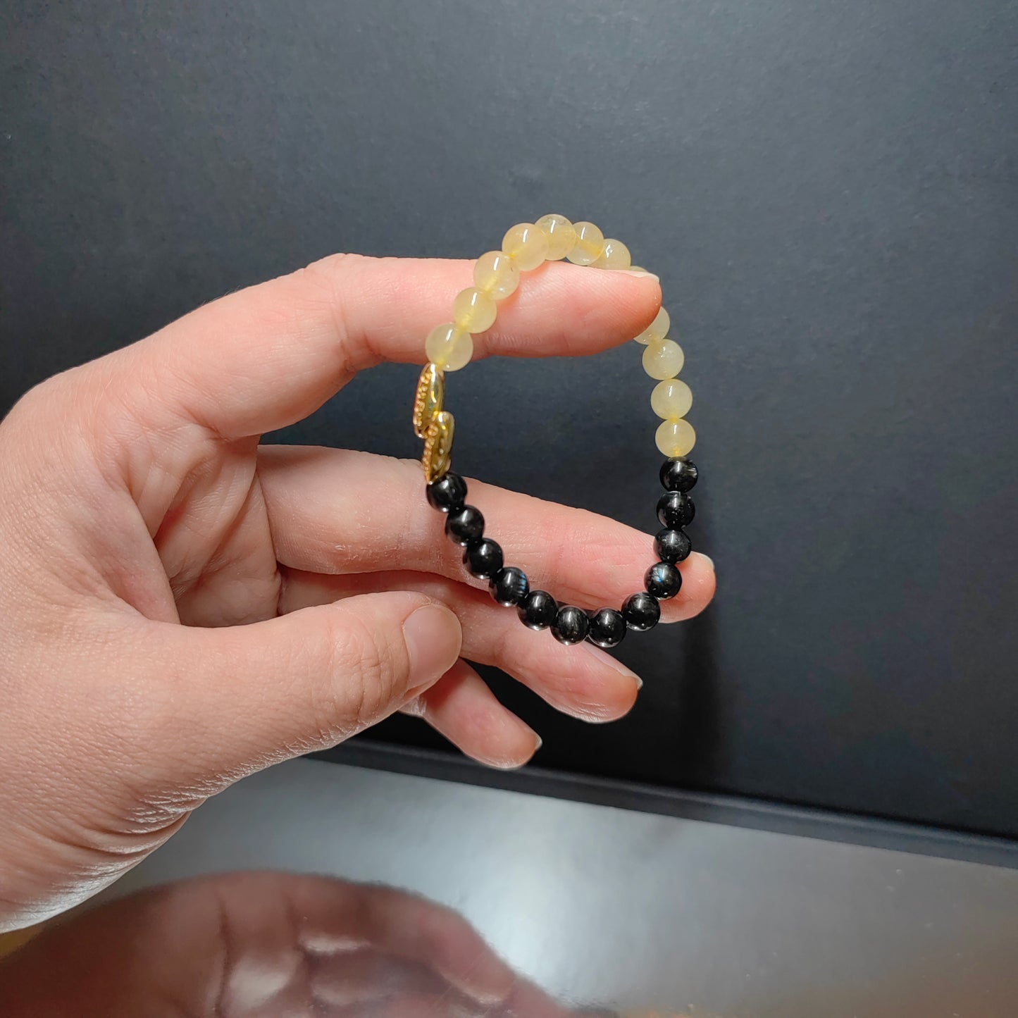pulsera de lujo de turmalina negra en plata 925 con detalles de ojo de tigre para una abundancia económica y elegancia cotidiana