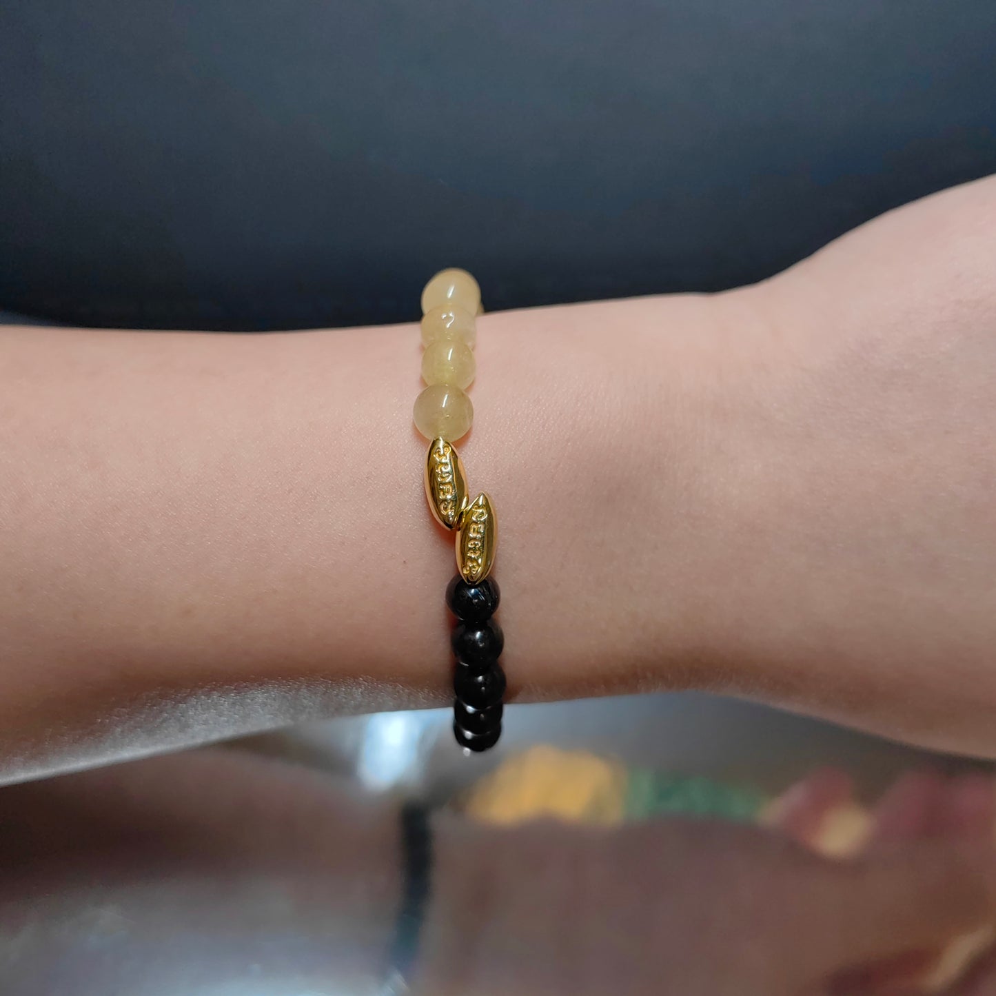 pulsera de lujo de turmalina negra en plata 925 con detalles de ojo de tigre para una abundancia económica y elegancia cotidiana