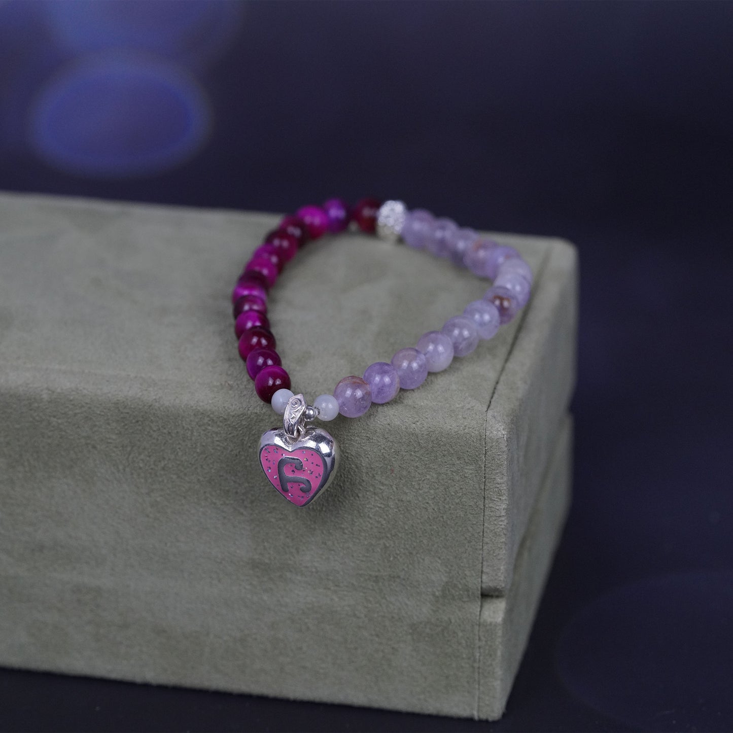 pulsera de ojo de tigre rosa con símbolo real π: amuleto de sanación espiritual para carisma y energía de liderazgo