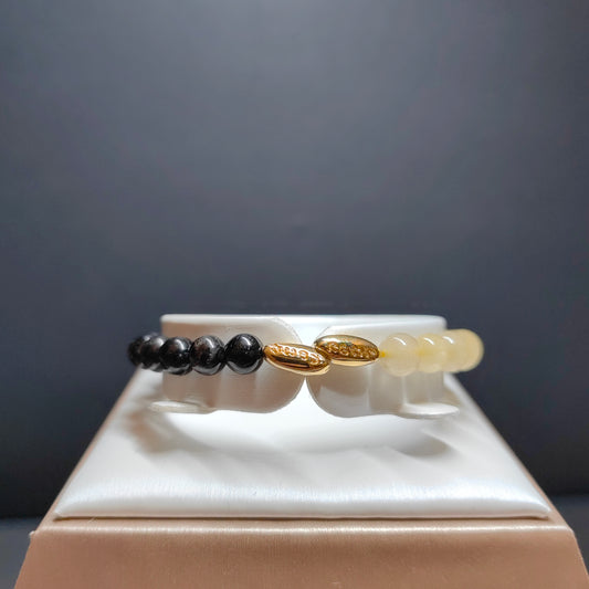 Pulsera de lujo de turmalina negra en plata 925 con detalles de ojo de tigre para una abundancia económica y elegancia cotidiana