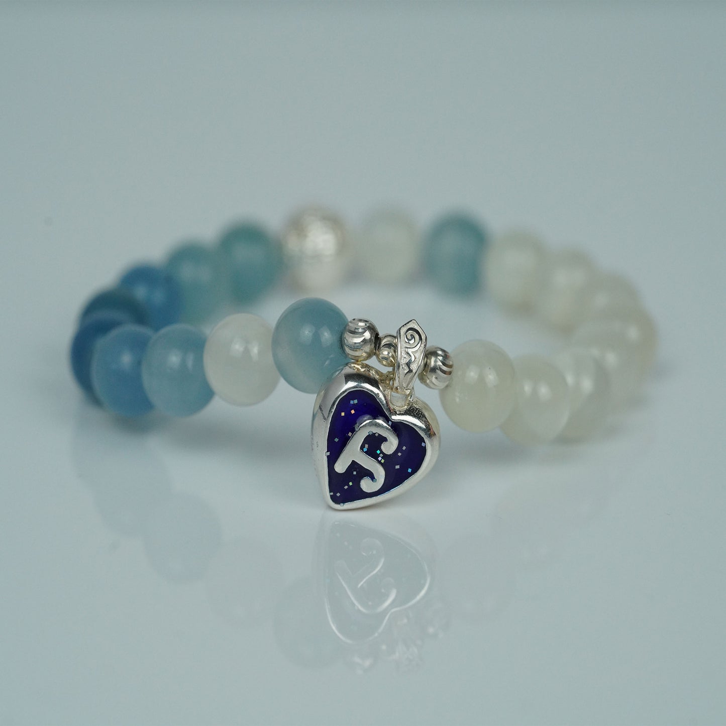 handmade blue crystal stone  charm bracelet with enamel π design -  spiritual jewelry for confidence boost