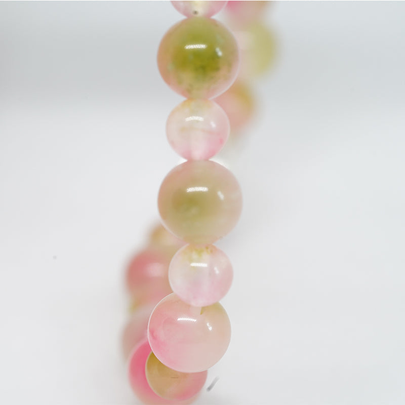 pulsera auténtica de piedra energética de buda sonriente: amuleto de calcedonia rosa para energía positiva y armonía romántica