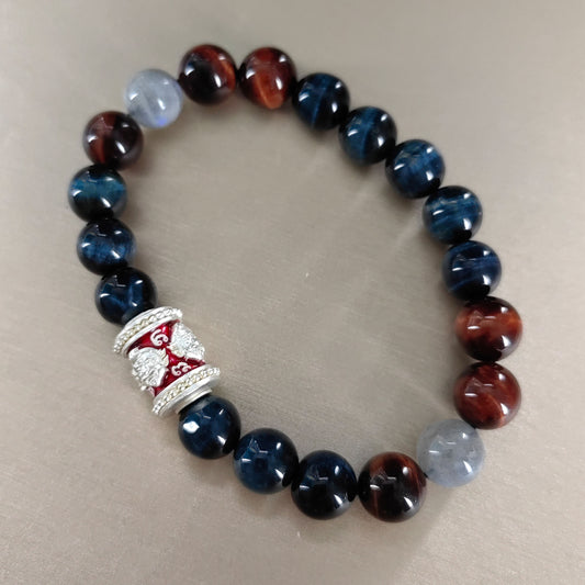 Pulsera de coraje esmaltada de Navaratna | Joyería energética hecha a mano con piedra de ojo de tigre multicolor para hombres y mujeres (diseño de protección mística)