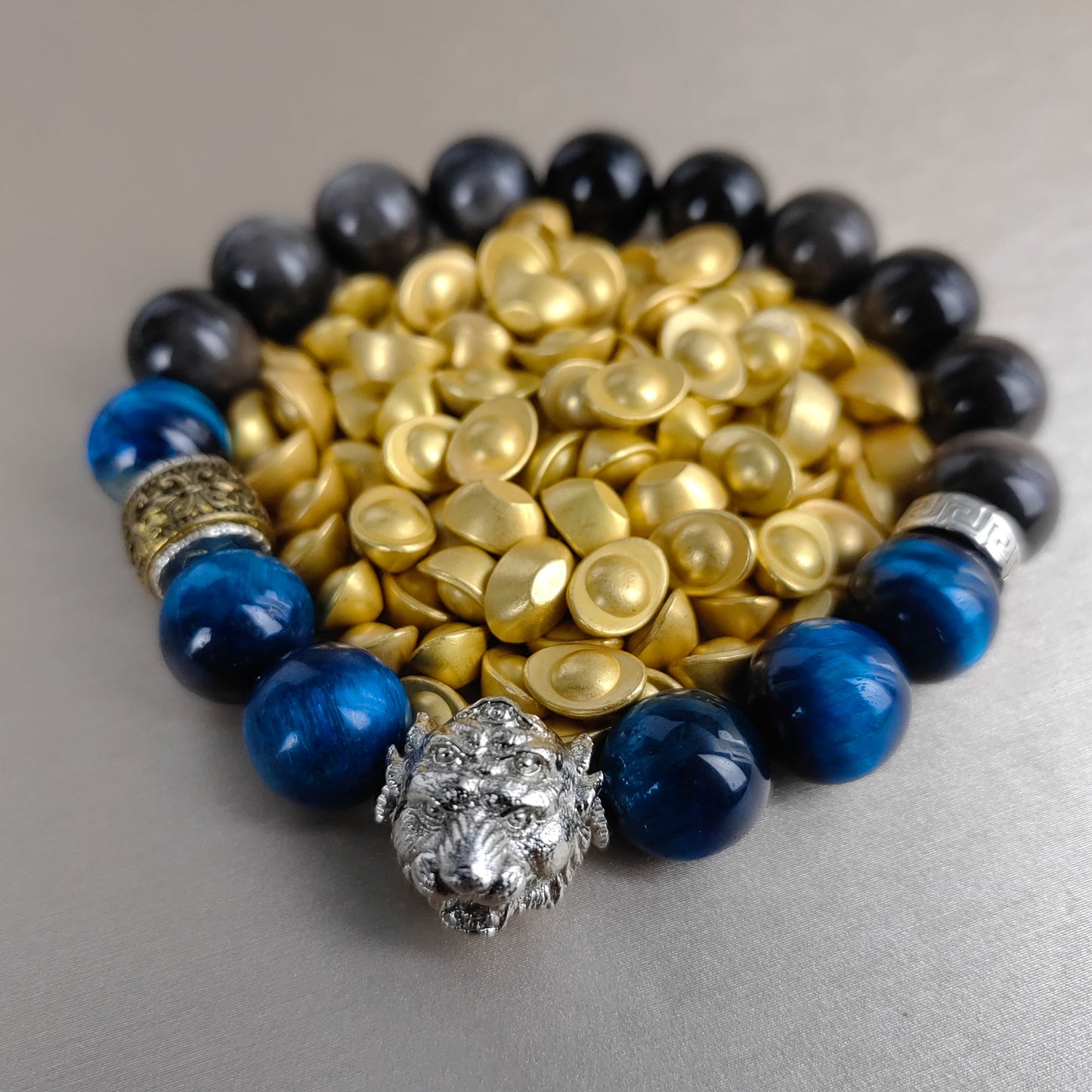 pulsera energética de cinco ojos y cuatro orejas con piedra de obsidiana y ojo de tigre para la confianza social y un aura positiva