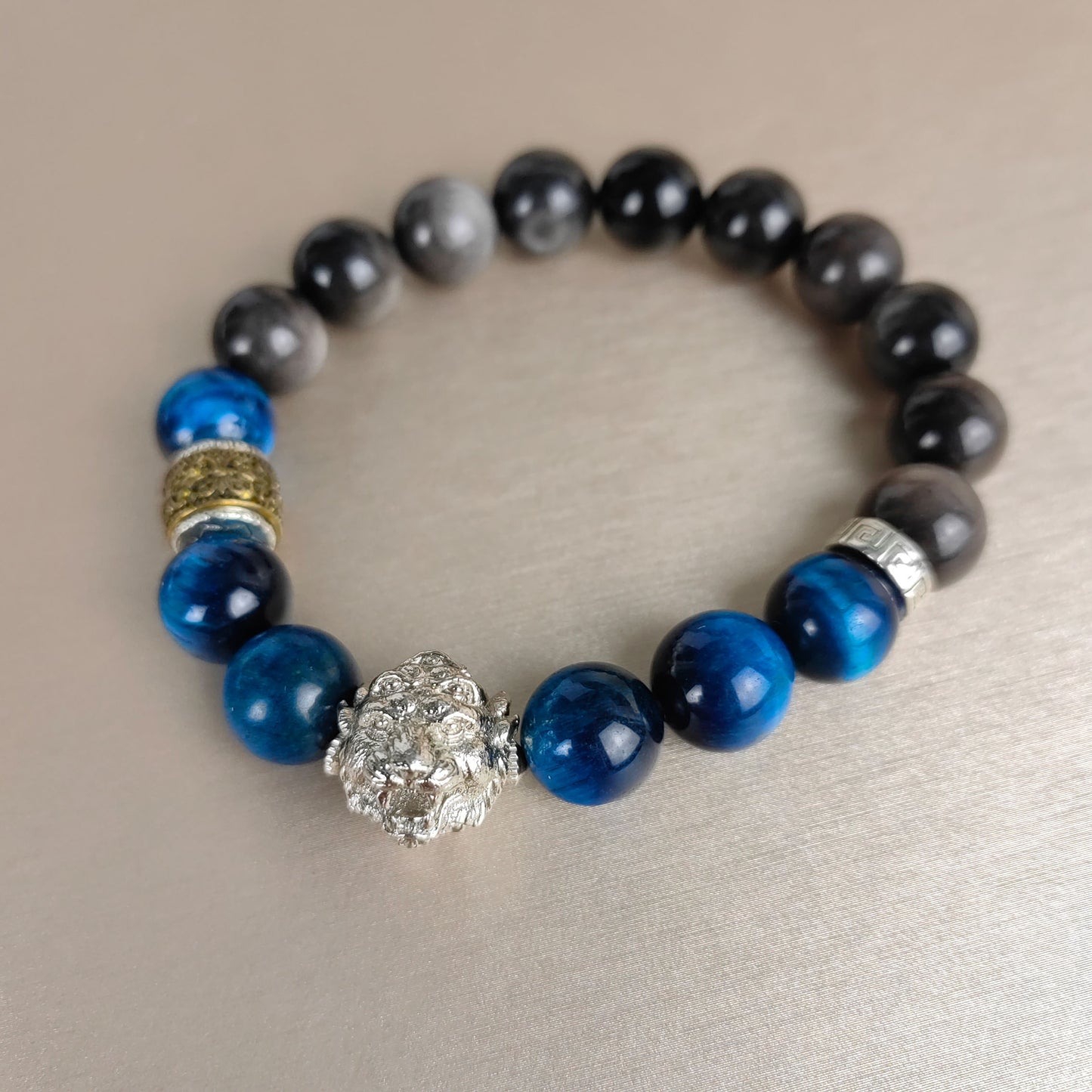 pulsera energética de cinco ojos y cuatro orejas con piedra de obsidiana y ojo de tigre para la confianza social y un aura positiva